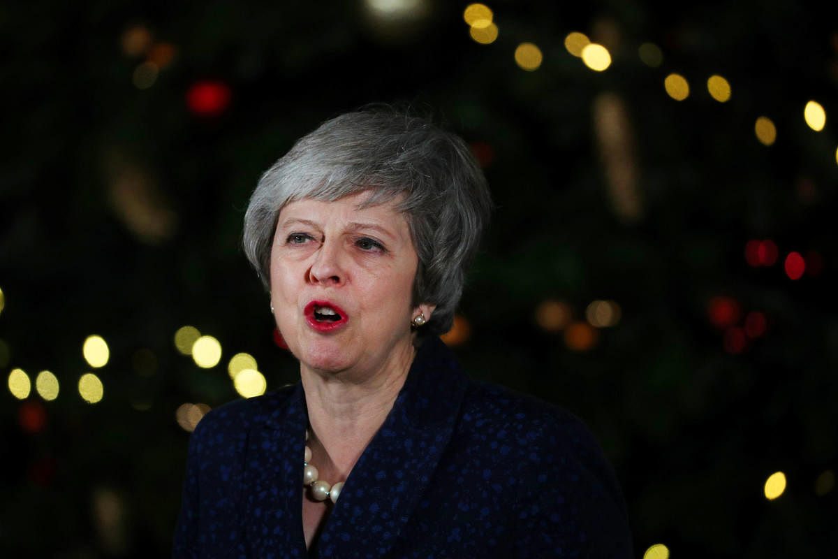 Britain's Prime Minister Theresa May speaks outside 10 Downing Street after a confidence vote by Conservative Party Members of Parliament (MPs), in London, Britain December 12, 2018. (REUTERS)