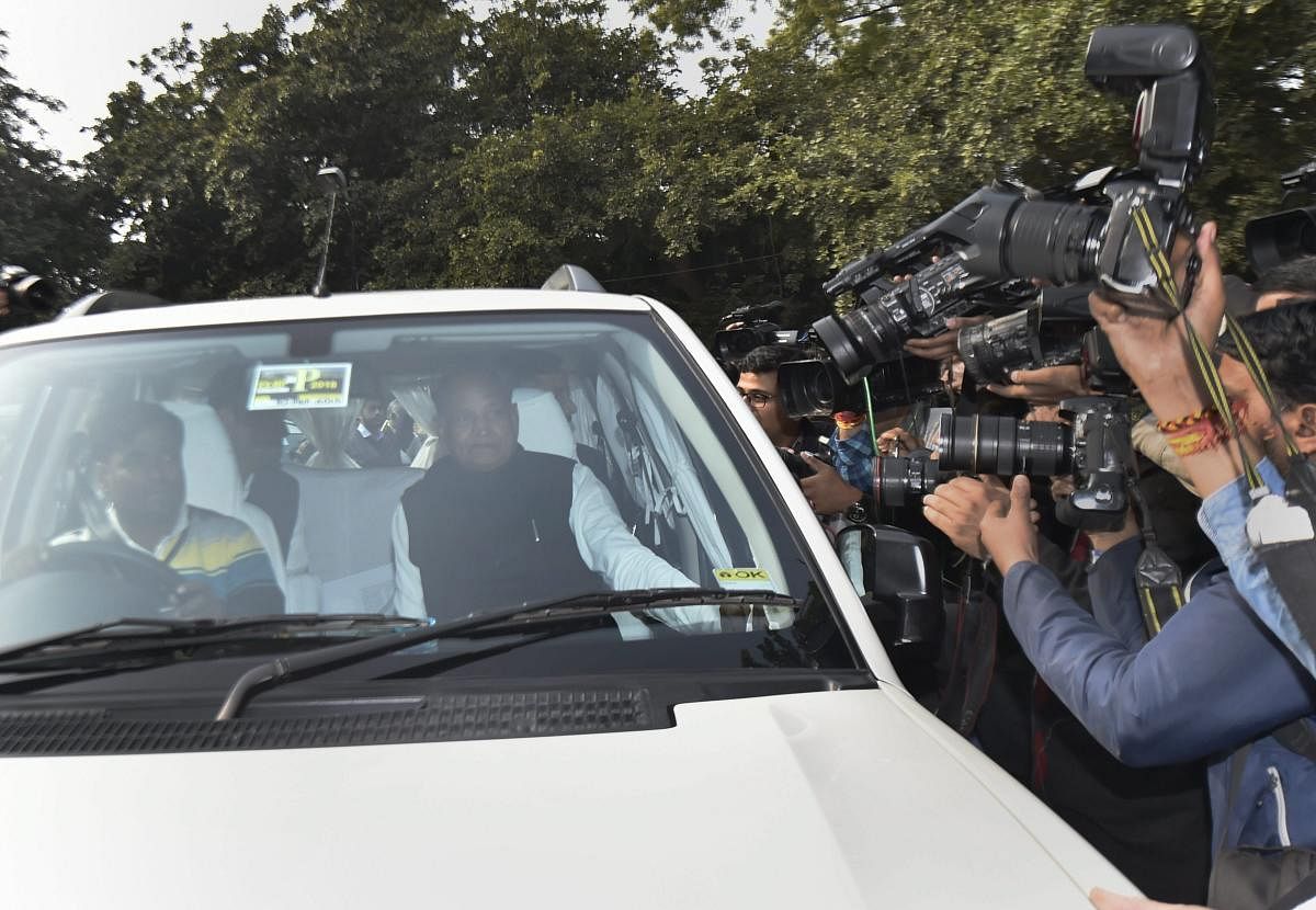 Congress senior leader Ashok Gehlot leaves after a meeting with Congress President Rahul Gandhi at his residence, in New Delhi on Thursday. PTI photo