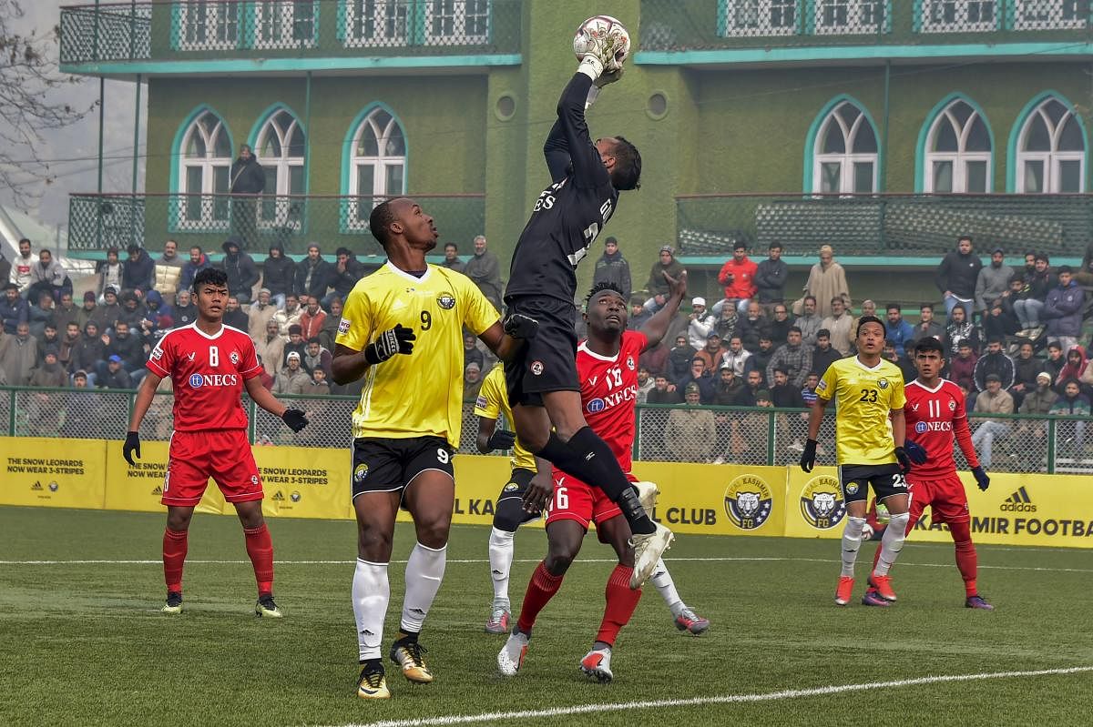 A slice of action from Real Kashmir FC's game against Aizawl FC (players in red) earlier this month. PTI 