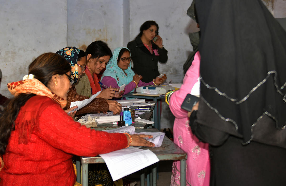 Of the 51,965 polling stations, 259 are all-women booth where both men and women came out to vote. (Photo by Suman Sarkar)