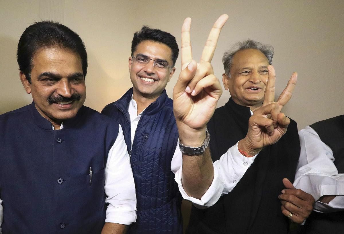 Congress leaders K C Venugopal, Sachin Pilot and Ashok Gehlot after the declaration of Rajasthan Assembly election result, in Jaipur on Tuesday. PTI