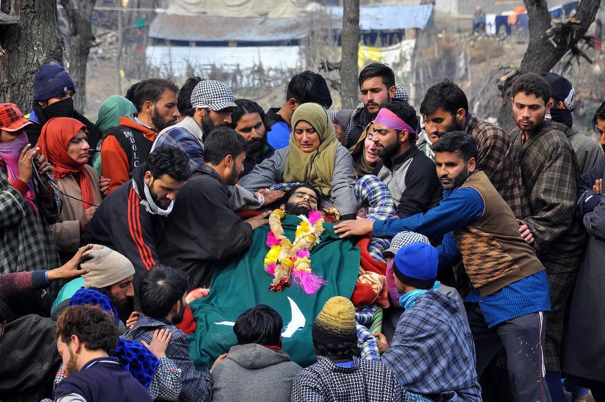 People grieve during the funeral of Al- badr Millitants Nawaz Ahmad Wagay in Reban, Shopian. (DH Photo/Umer Asif)