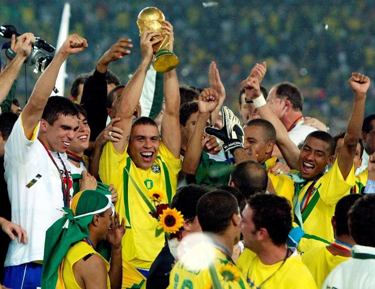 Brazil’s Ronaldo (centre) celebrates with team-mates after their triumph in the 2002 World Cup.