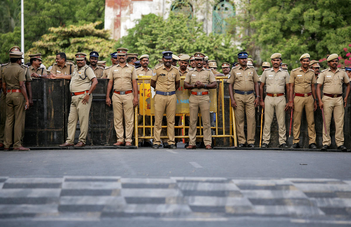 Policemen stand guard ahead of a protest, after at least 13 people were killed when police fired on protesters seeking closure of plant on environmental grounds in town of Thoothukudi in Tamil Nadu. REUTERS