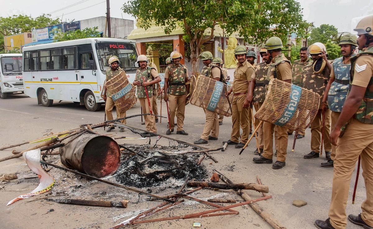 Police personnel deployed after violent protests demanding the closure of Vedanta's Sterlite Copper unit, in Tuticorin, on Thursday. Over 100 people were arrested for protesting police firing on Tuesday and Wednesday in the port city that left 13 dead. (P