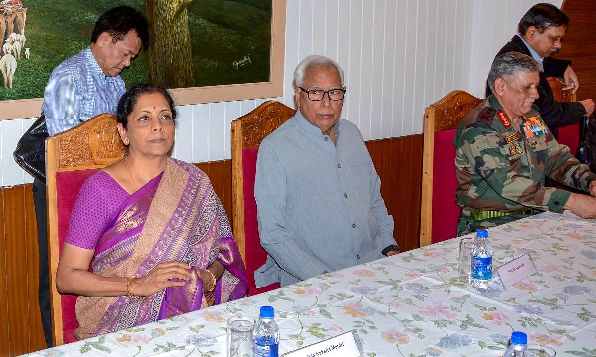 Srinagar: J &amp; K Governor N N Vohra and Union Defence Minister Nirmala Sitharaman at a high-level meeting held to review the security, at the Raj Bhavan in Srinagar on Monday, June 25, 2018. (PTI Photo)(PTI6_25_2018_000237B)