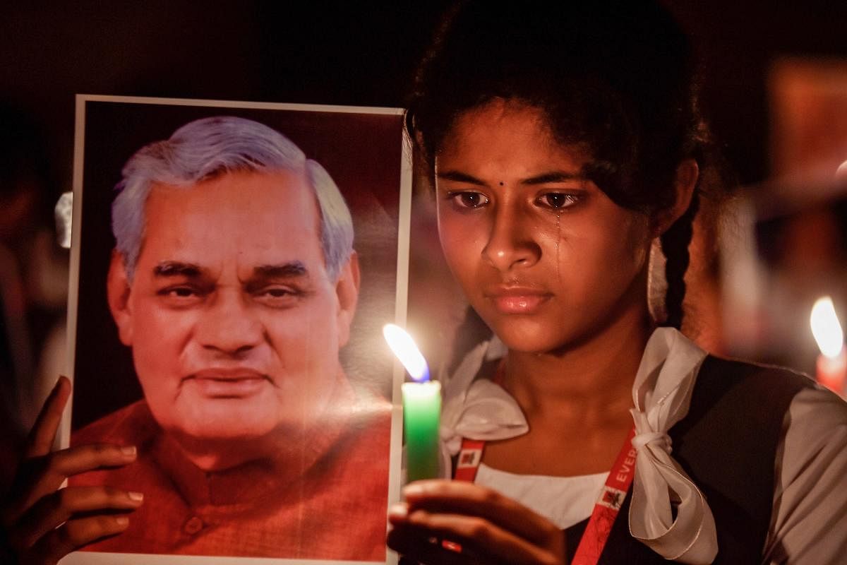 Students participate in a candlelight vigil to pay tribute to former prime minister Atal Bihari Vajpayee in Chennai on Thursday. PTI