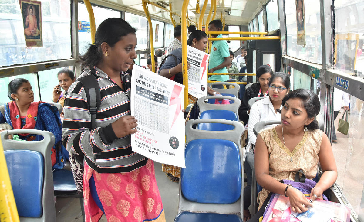 Volunteers of Bengaluru Bus Prayanikara Vedike campaign against the proposed fare hike. DH FILE PHOTO