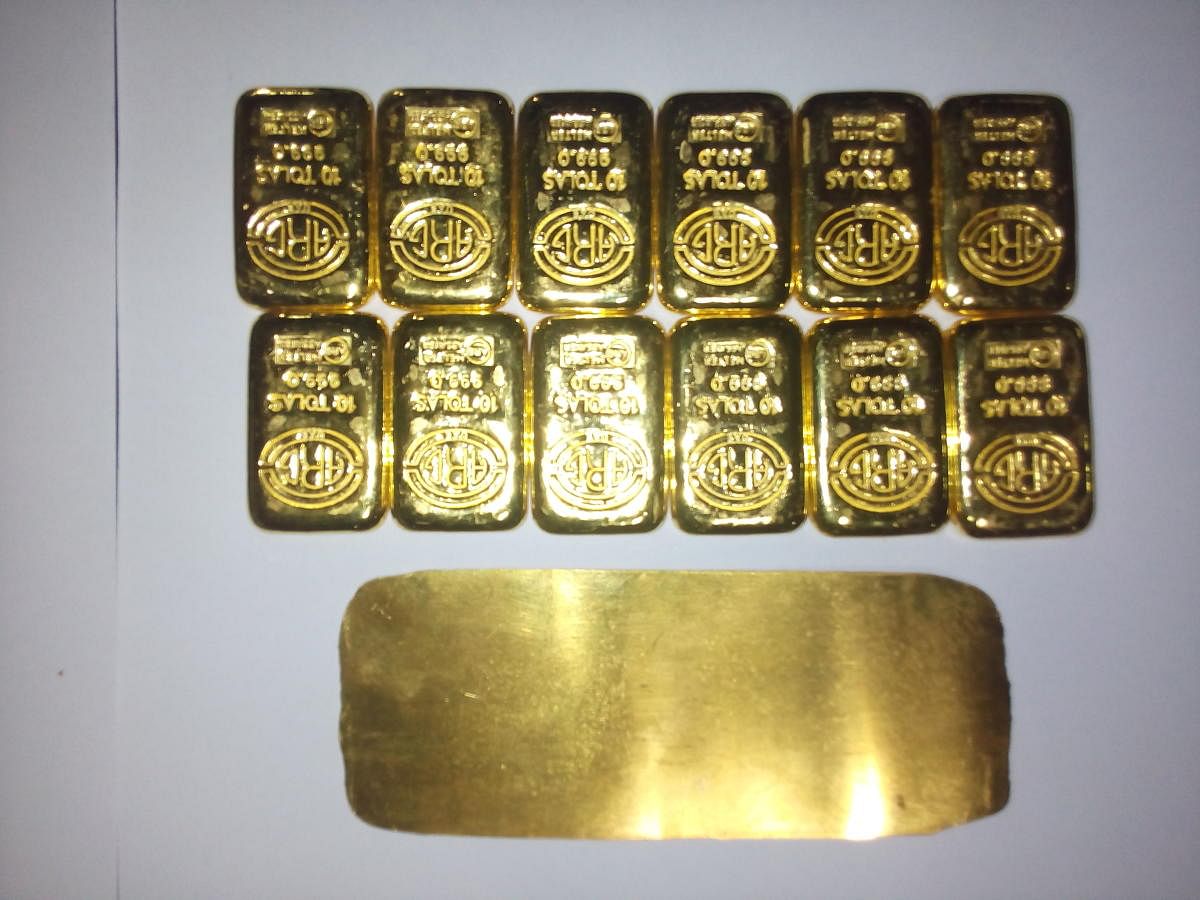 The gold bars and sheet seized from a passenger at Mangaluru International Airport. 
