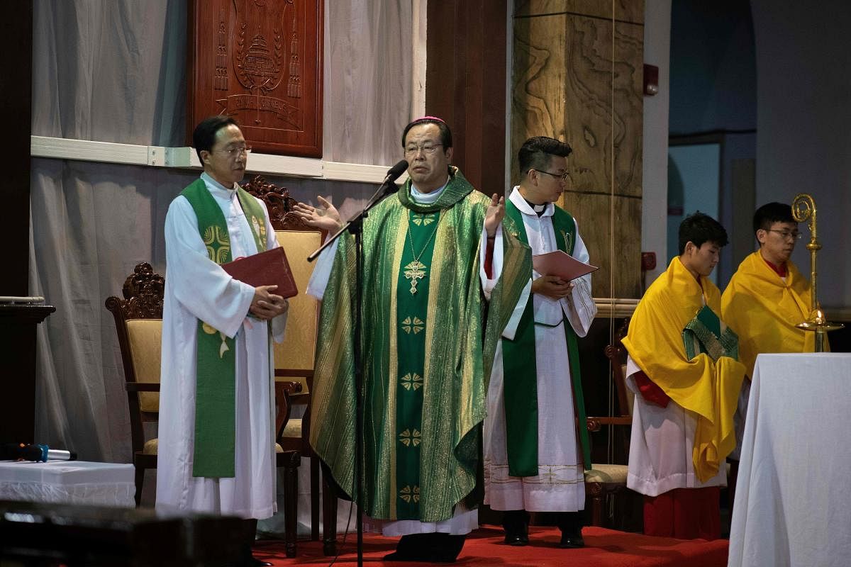 Bishop Joseph Li Shan leads a mass at the South Cathedral in Beijing on September 22, 2018. AFP