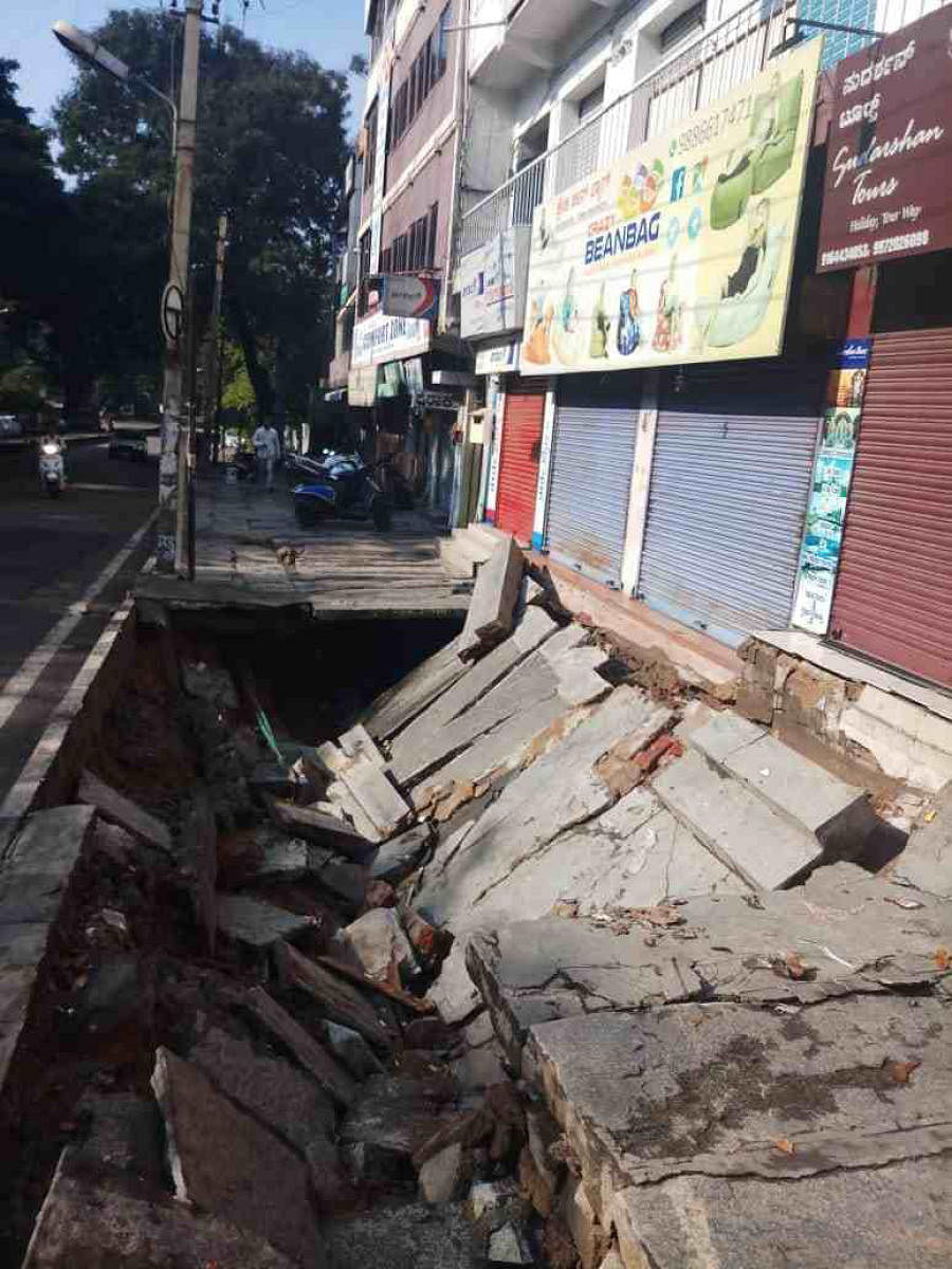 The pavement that caved in at Navrang, near Rajajinagar, following the heavy rain on Tuesday.