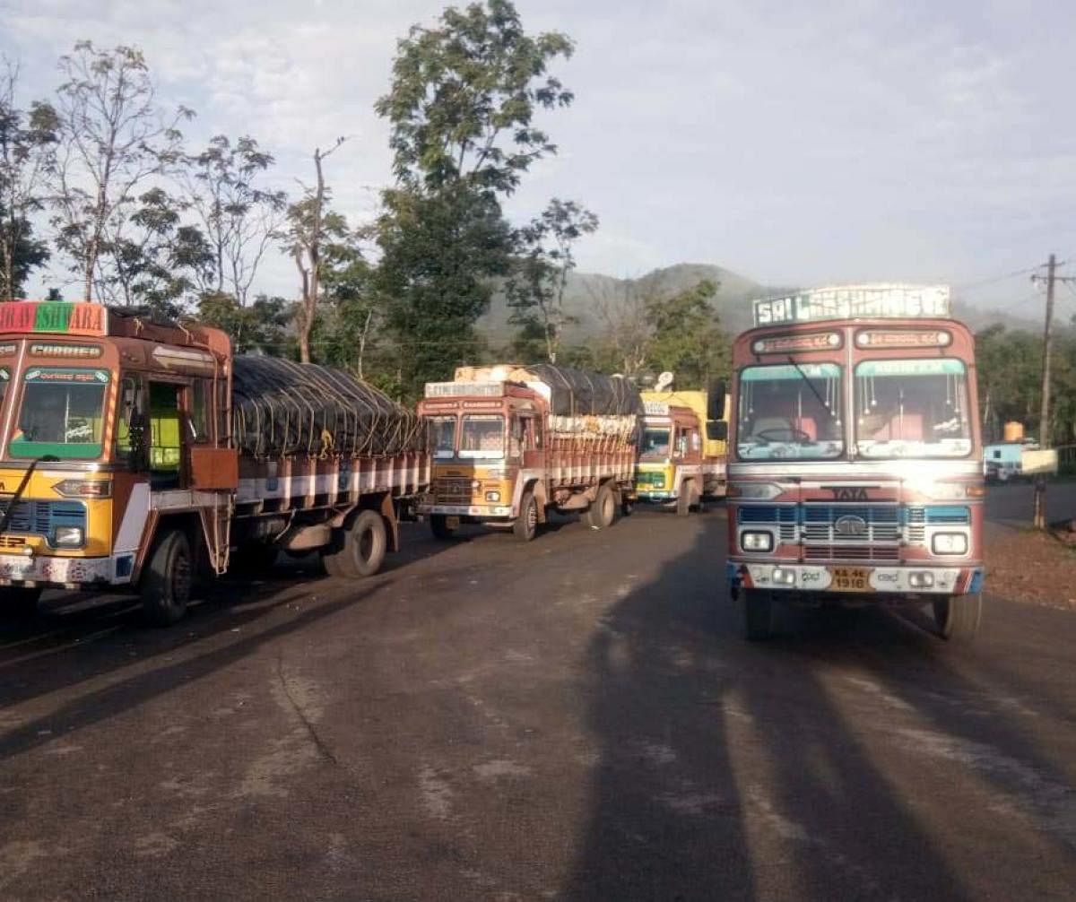 Lorries intercepted by villagers at Vanaguru junction on the Bisle-Kukke-Subramanya Road, in Hassan taluk, recently.