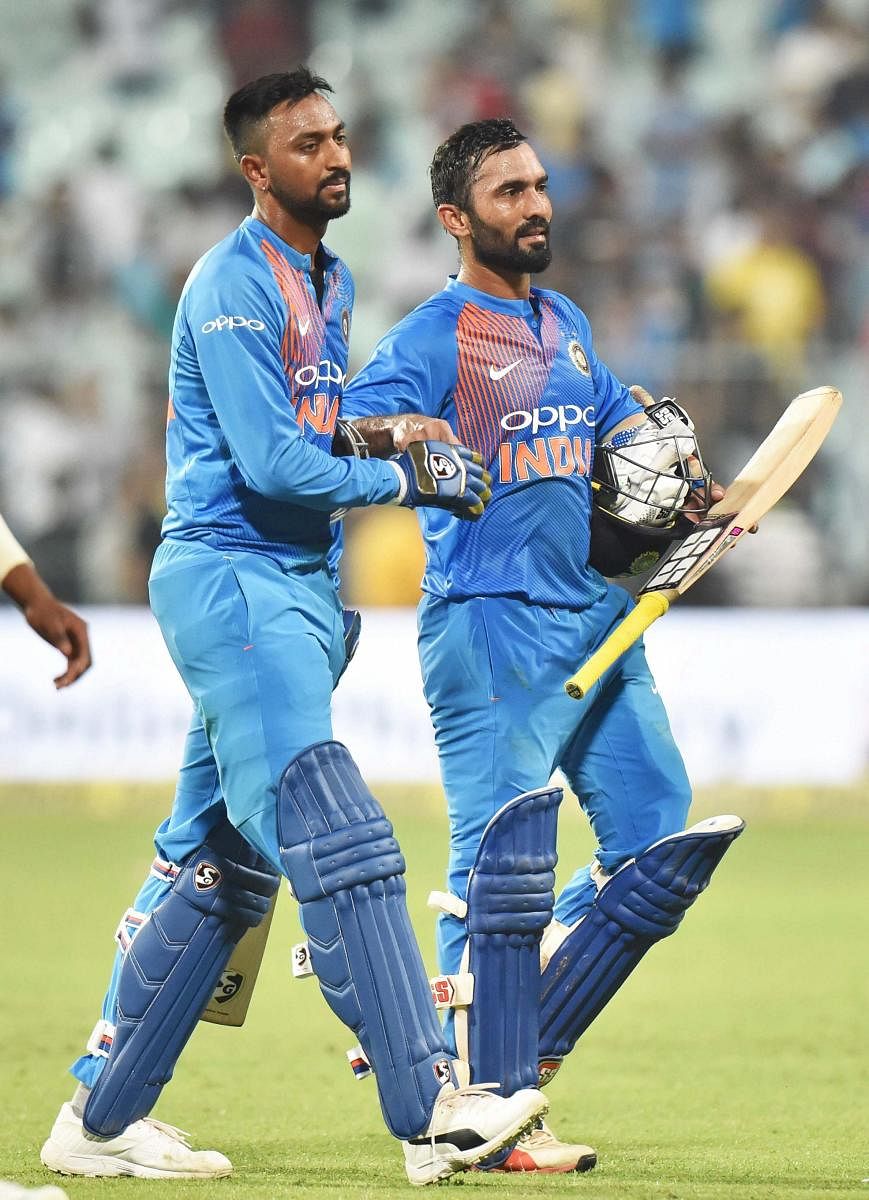 Krunal Pandya (left) and Dinesh Karthik saved India the blushes with an unbroken stand for the sixth wicket in the first T20I in Kolkata. PTI