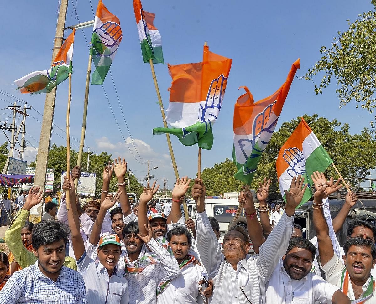 Congress supporters celebrate party candidate V S Ugrappa's win in the Bellary Loksabha by-poll election, in Bellary, Karnataka, on Tuesday. PTI