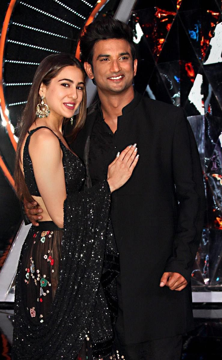 Bollywood actors Sushant Singh Rajput and Sara Ali Khan pose for a photograph during their film promotion 'Kedarnath'.