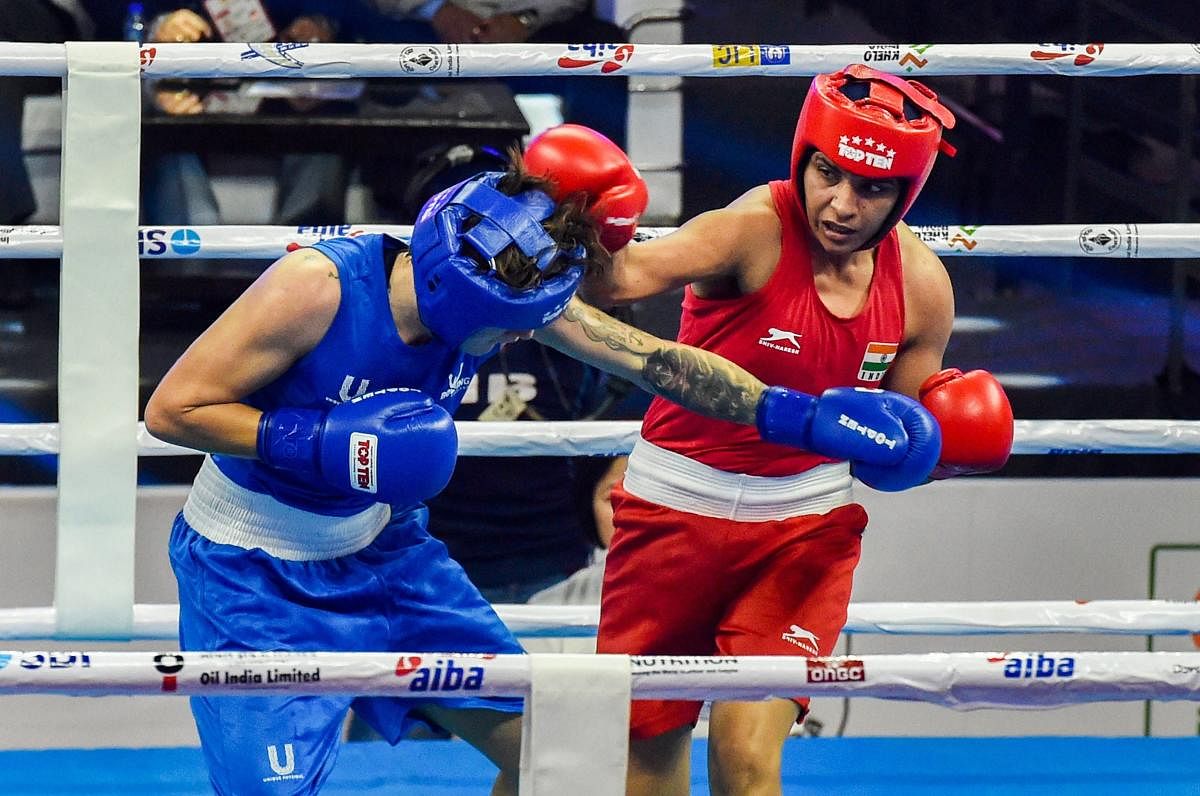 India’s Simranjit Kaur (right) in action against Scotland's Megan Reid in the 64kg class of the World Boxing Championships in New Delhi on Monday. PTI