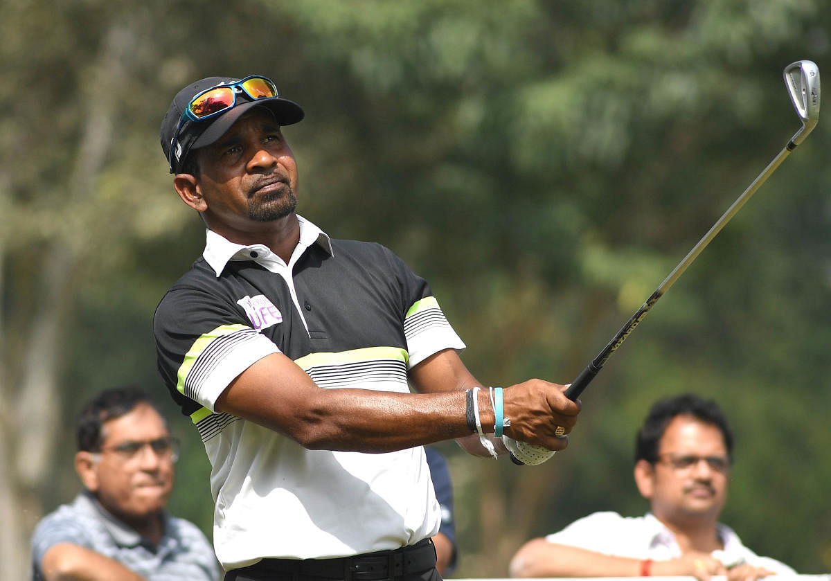 Sri Lanka's Anura Rohana watches his tee shot during the third round of the Bengaluru Open on Saturday. DH PHOTO/ SRIKANTA SHARMA R
