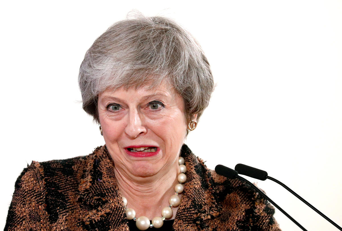 British Prime Minister Theresa May reacts as she attends a news conference after a European Union leaders summit in Brussels, Belgium December 14, 2018. REUTERS/Francois Lenoir