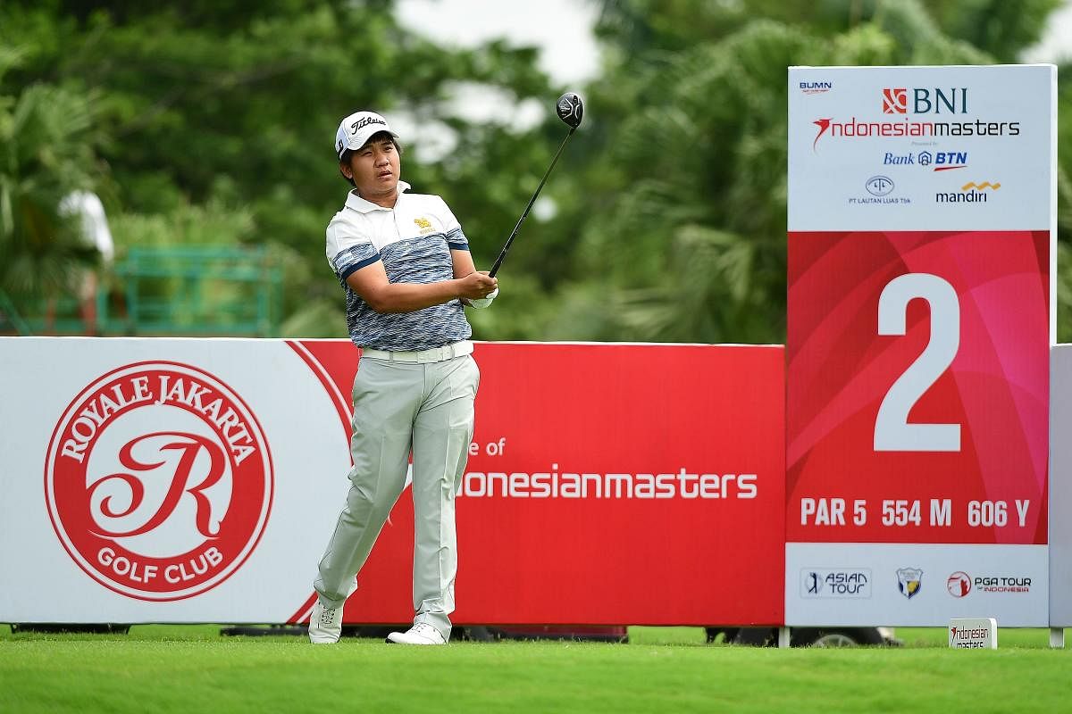 Thailand's Poom Saksansin tees off during the third round of the Indonesian Masters on Saturday. AFP