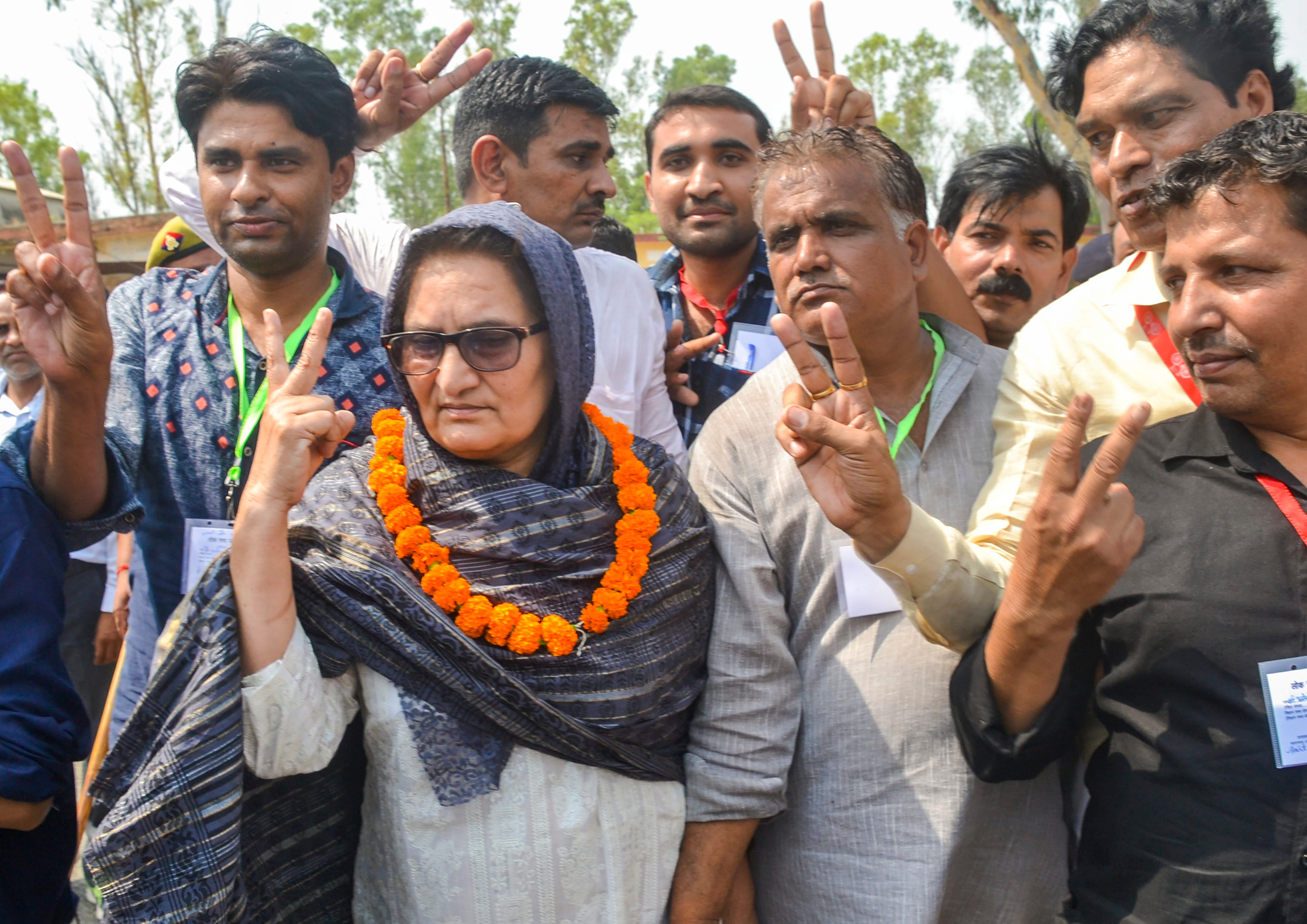 Rashtriya Lok Dal candidate Tabassum Hasan with her supporters outside a counting centre after winning the Kairana Lok Sabha by-elections, in Kairana on Thursday, May 31, 2018. Hasan was also supported by the Congress, Samajwadi Party and Bahujan Samaj Party. PTI file photo