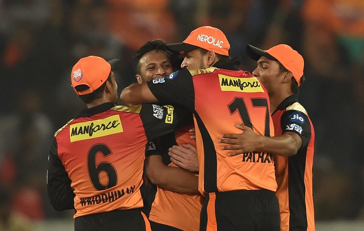 THRILLED: Sunrisers Hyderabad players celebrate after clinching a nervy five-run win over Royal Challengers Bangalore in Hyderabad on Monday. PTI