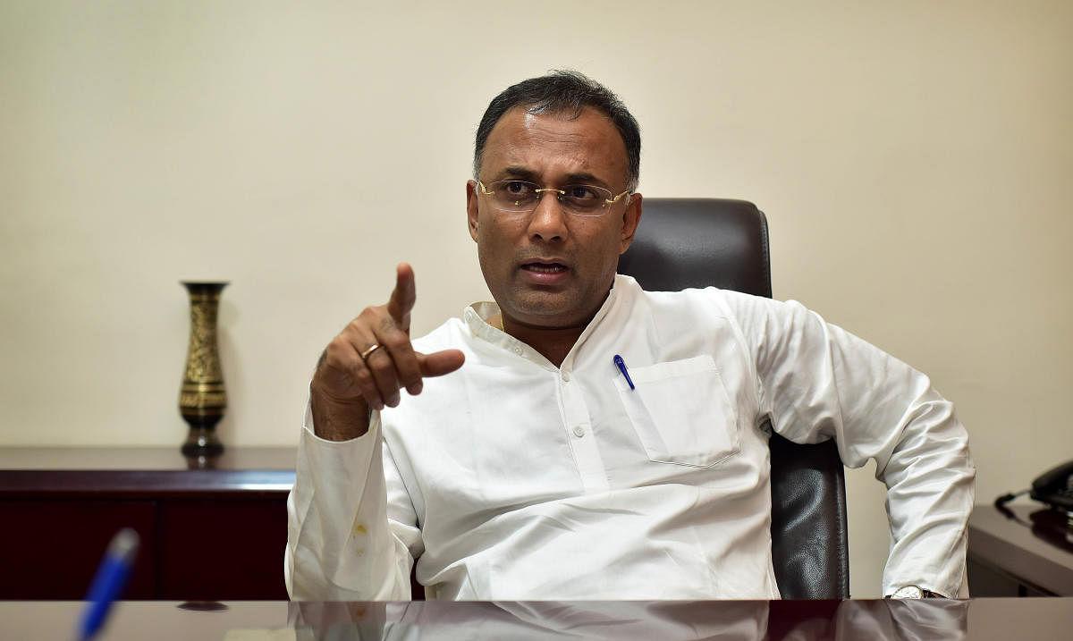 Accusing BJP of still trying to poach Congress MLAs, Karnataka Pradesh Congress chief Dinesh Gundu Rao on Tuesday alleged that it was trying to bring down his party's coalition government with JDS in the state. DH file photo