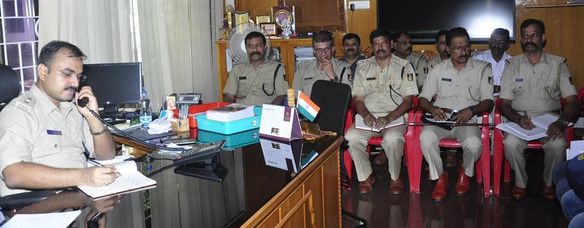 Superintendent of Police Lakshman Nimbargi during the phone in programme in Udupi on Friday.
