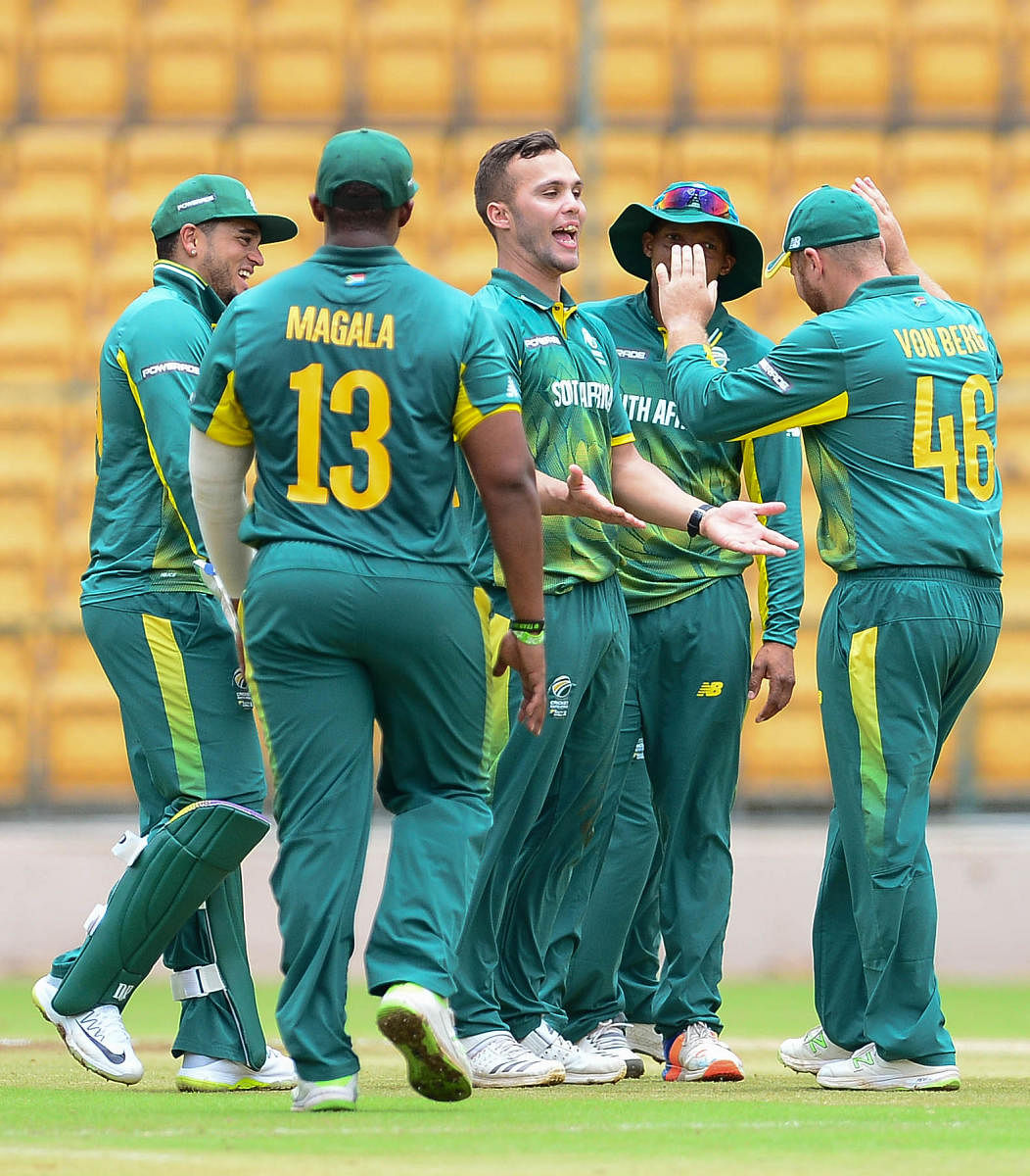 SIZZLING Dane Pietersen (centre) celebrates with team-mates after dismissing an India ‘A’ batsman. DH PHOTO/ SATISH BADIGER 