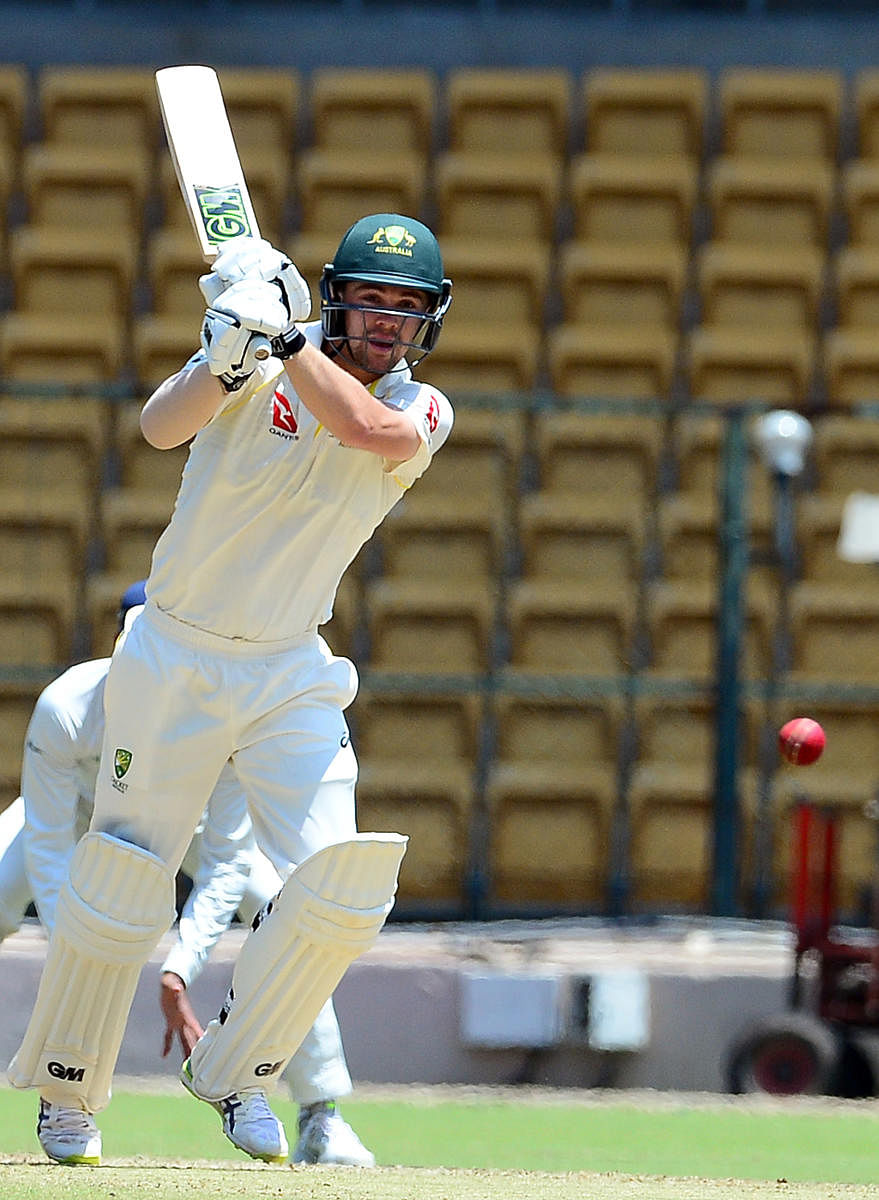 VALIANT: Travis Head of Australia ‘A’ en route his 87 against India ‘A’ during their four-day match. DH PHOTO/ SATISH BADIGER