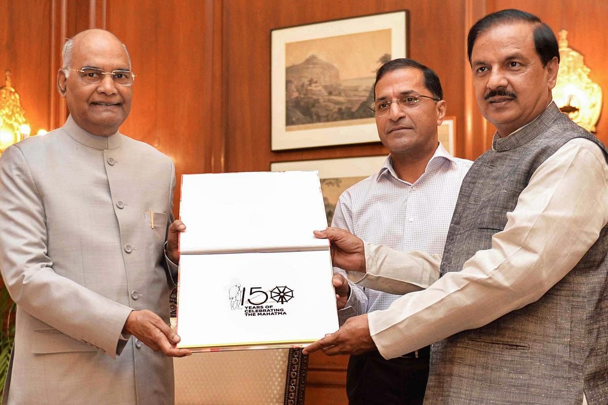 President Ram Nath Kovind launches the logo for the commemoration of 150th Birth Anniversary of Mahatma Gandhi and a web portal during a function at Rashtrapati Bhavan, in New Delhi on Tuesday. PTI