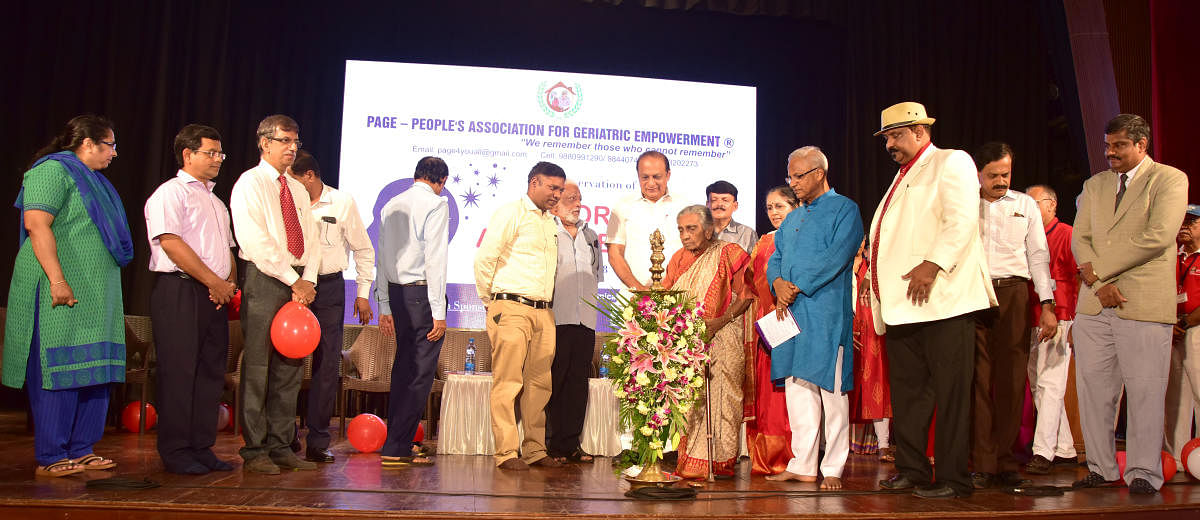 Dr Olinda Pereira, president of People’s Association for Geriatric Empowerment (PAGE), inaugurates the World Alzheimer’s Day programme at Town Hall, Mangaluru, on Saturday.