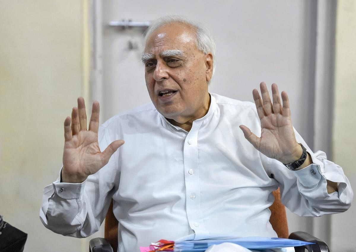 At a press conference, Congress leader Kapil Sibal pointed to a part of Friday's judgment in which the Supreme Court said the material placed before it shows the Centre did not disclose in Parliament the pricing details of the fighter jet but revealed it to the Comptroller and Auditor General. (PTI Photo)