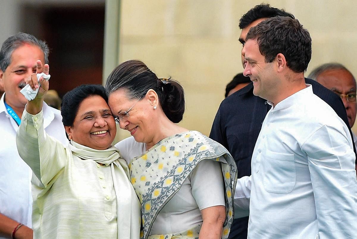 BSP chief Mayawati is seen with Congress leaders Sonia Gandhi and Rahul Gandhi during the swearing-in ceremony of JD(S)-Congress coalition government in Bengaluru in May 2018. PTI