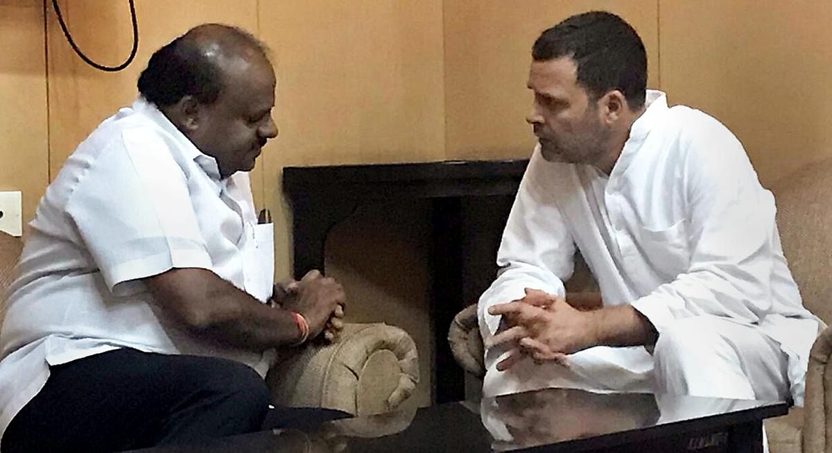 Congress president Rahul Gandhi (right) meets Karnataka Chief Minister H D Kumaraswamy in Bengaluru. (PTI File Photo)