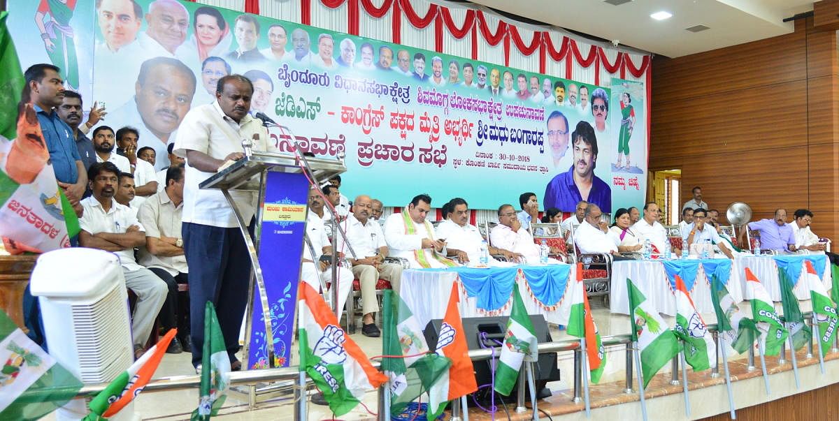 Chief Minister H D Kumaraswamy addresses an election campaign rally at Trasi near Byndoor on Tuesday. 