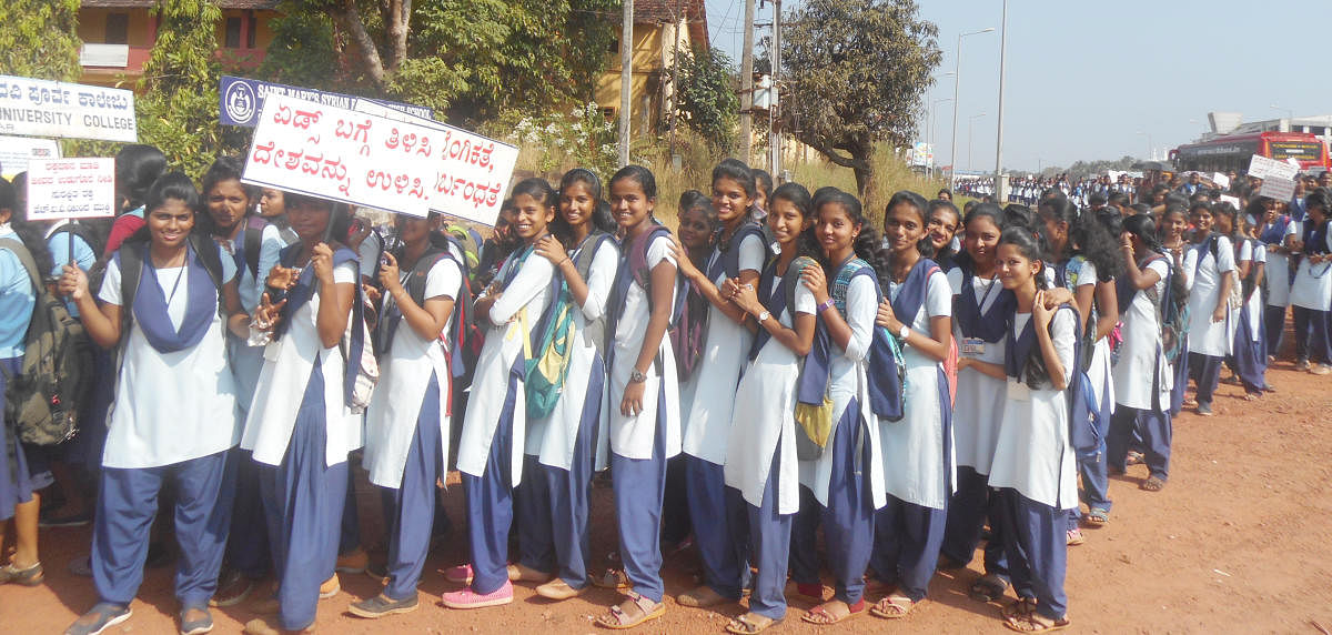 Students take out an awareness rally to create awareness on HIV/Aids at Brahmavar on Saturday.