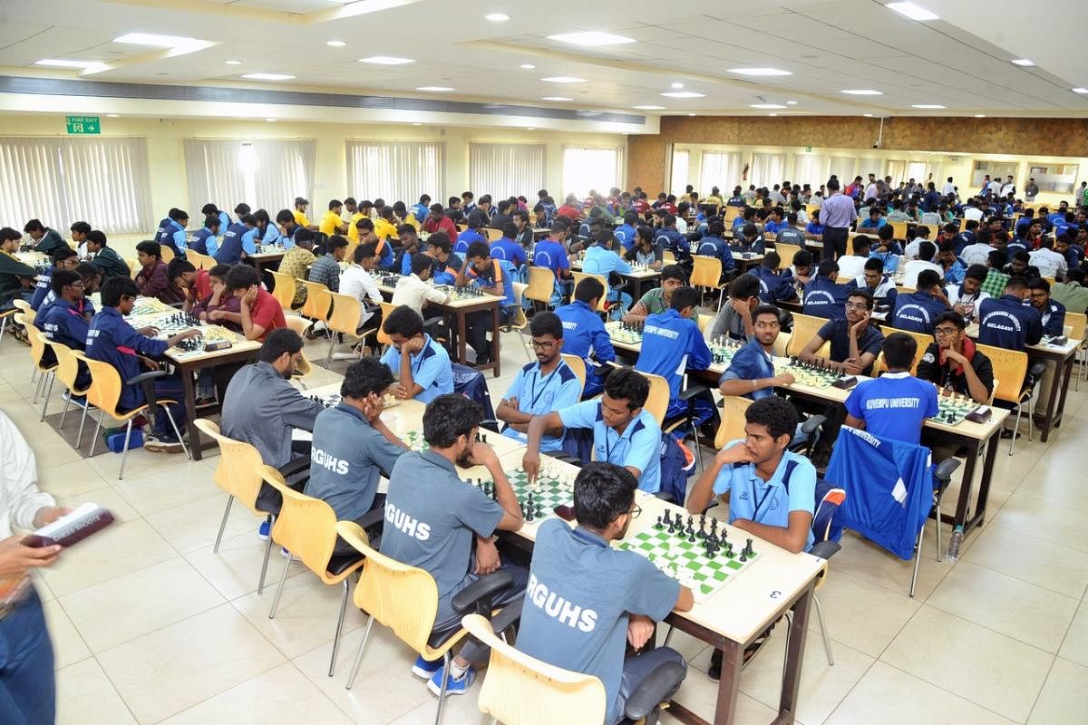 Players in action during the South Zone Inter-University Chess Tournament held at the Dr T M A Pai Hall in Manipal on Tuesday.