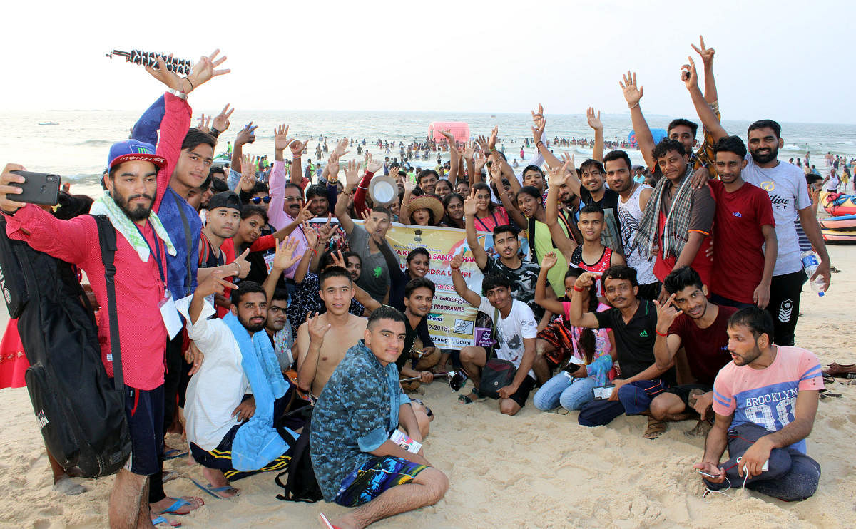 Youth from Uttarkhand and Karnataka on the shores of a beach in Udupi. 