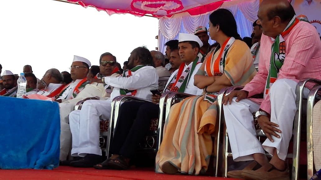 Congress leaders with the candidate in Jamakhandi Assembly constituency Anand Nyamgouda during an election rally in the constituency. (Courtesy: Twitter/INCKarnataka)