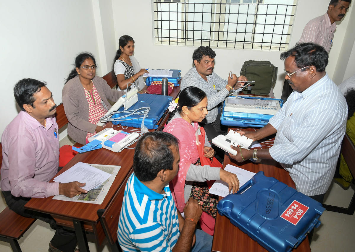 Election officials prepare to conduct election for Urban Local Body, in Mysuru, on Thursday.