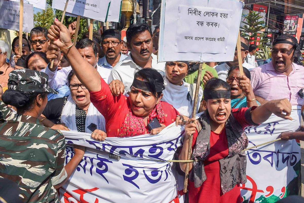 Activists take part in a protest against the killing of innocent people in Tinsukia district by suspected United Liberation Front of Assam (ULFA) terrorists at Kherbari Bisonibari in Tinsukia district. PTI