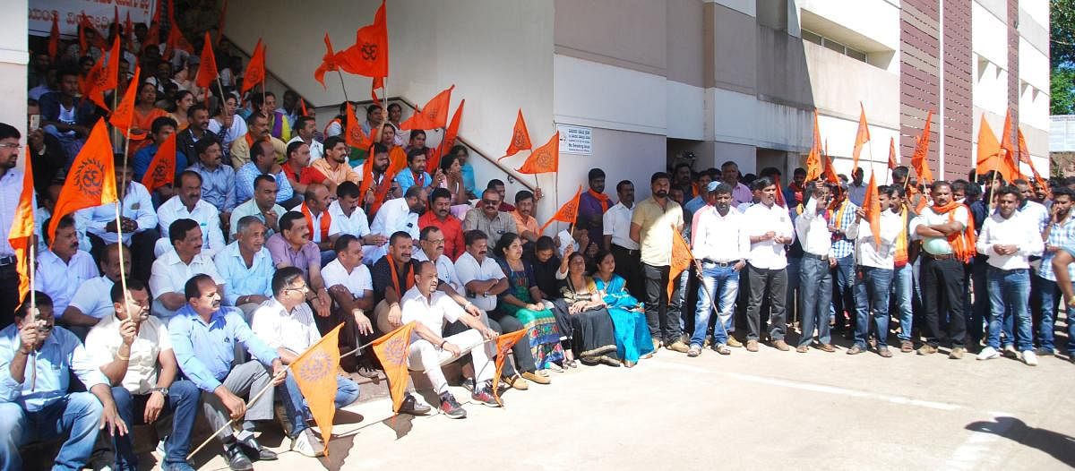 Members of Tipu Jayanti Virodhi Horata Samithi, BJP district unit, Vishwa Hindu Parishat and Hindu Jagarana Vedike stage a protest in front of the deputy commissioner’s office in Madikeri on Friday.
