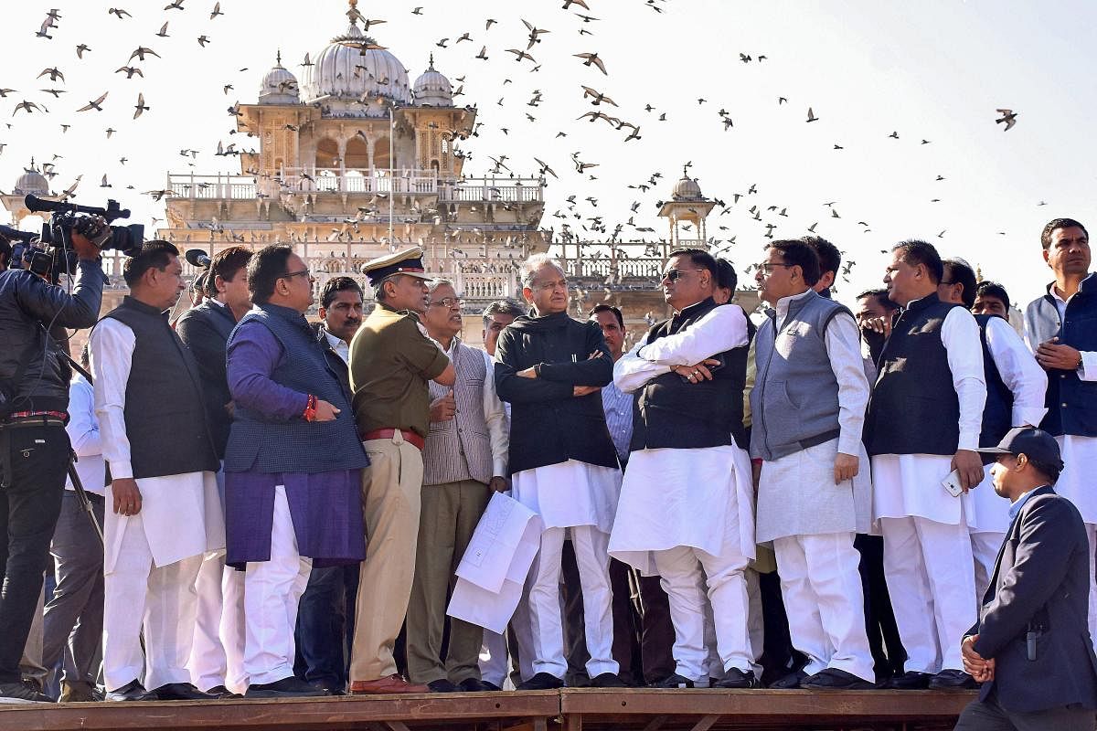 Chief Minister designate Ashok Gehlot and AICC general secretary Avinash Pande review the preparations a day before the swearing-in ceremony at Albert Hall, in Jaipur on Sunday. PTI