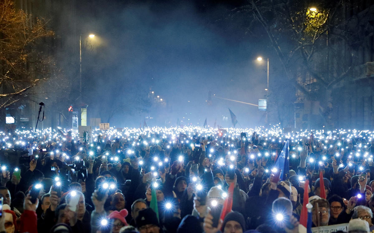 People take part in a protest against a proposed new labor law, billed as the "slave law", in Budapest, Hungary. Reuters Photo 