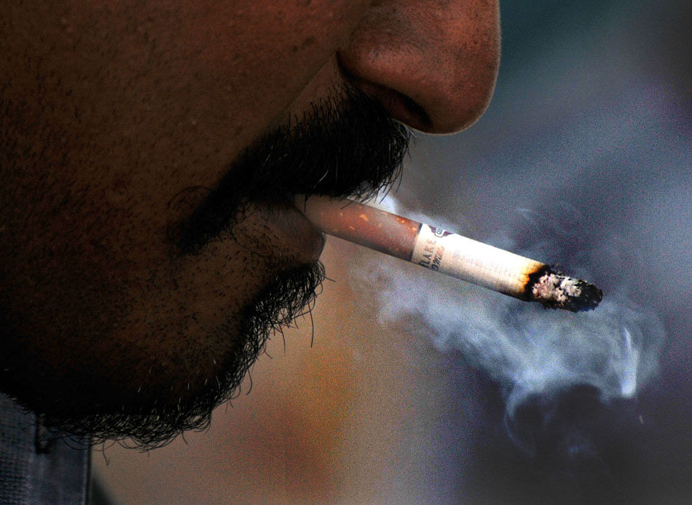 Even though the use of tobacco, such as smoking, is prohibited in public places, violations are rampant. (DH File Photo.For representation purpose)