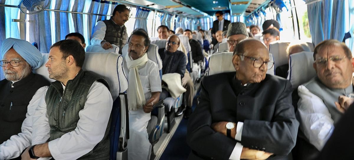 Congress President Rahul Gandhi (2nd L), former prime minister Manmohan Singh (L), NCP chief Sharad Pawar (2nd R), Loktantrik Janata Dal chief Sharad Yadav (R) and other senior opposition leaders on their way to Albert Hall to attend the swearing-in ceremony of Ashok Gehlot government, in Jaipur, Monday, Dec. 17, 2018. (PTI Photo)