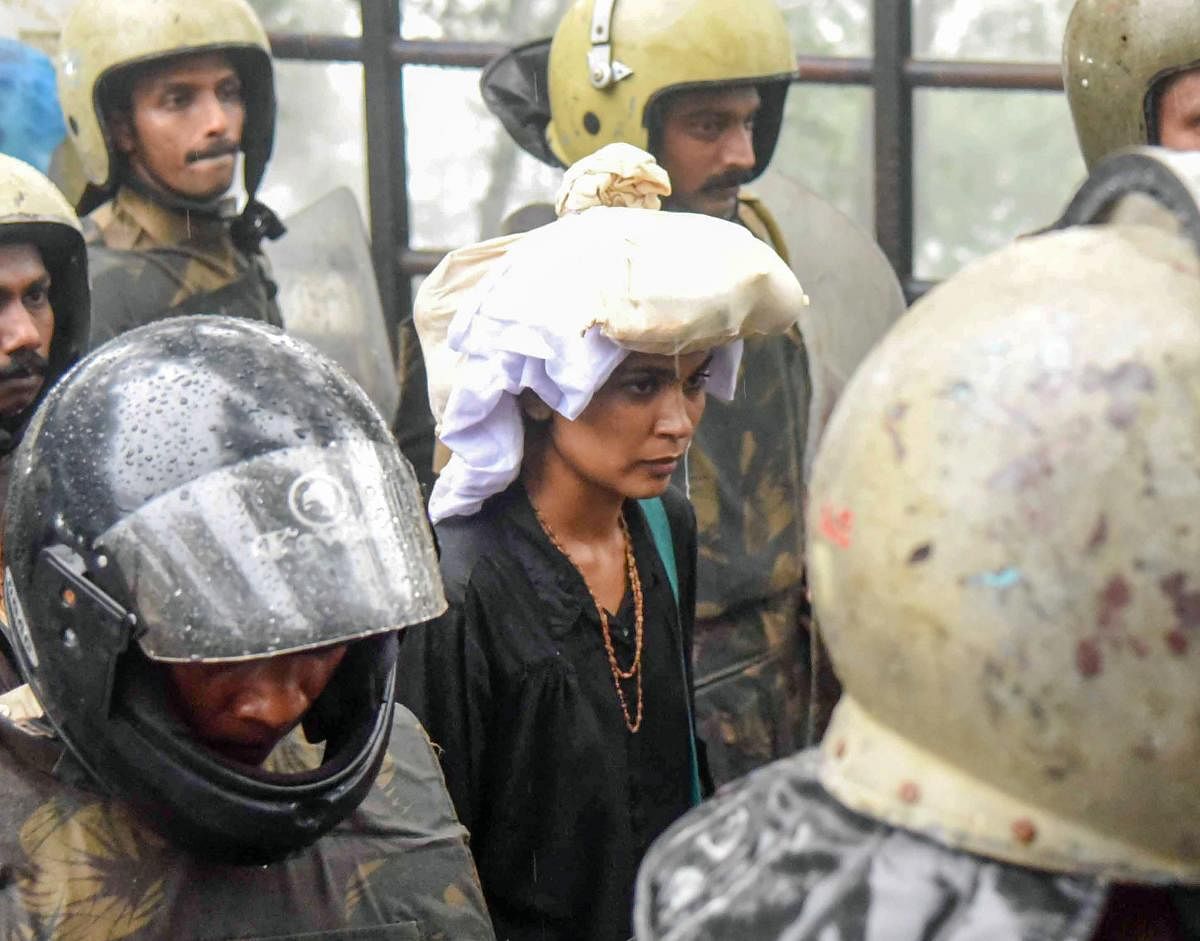 Activist Rehana Fathima being escorted by the police to Sabarimala Temple, Kerala on October 19, 2018. PTI