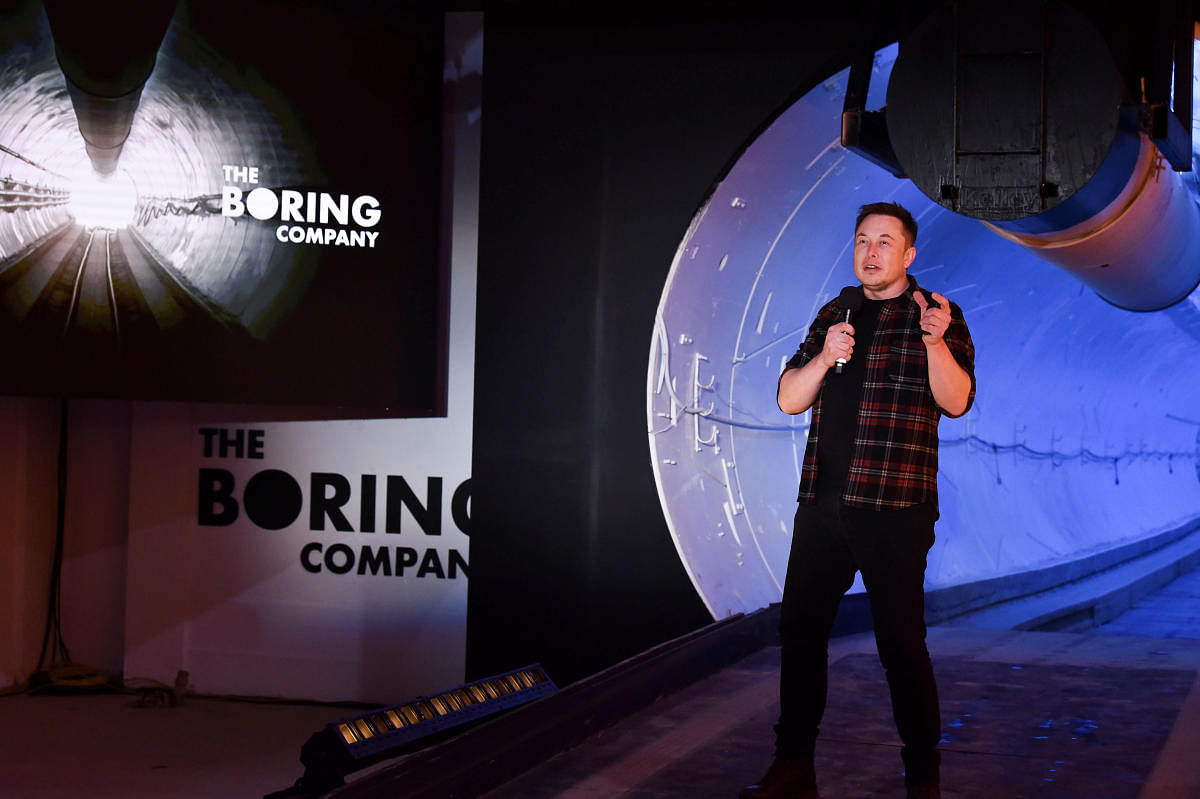 Tesla Inc. founder Elon Musk speaks at the unveiling event by "The Boring Company" for the test tunnel of a proposed underground transportation network across Los Angeles County, in Hawthorne, California, U.S. December 18, 2018. Robyn Beck/Pool via REUTER