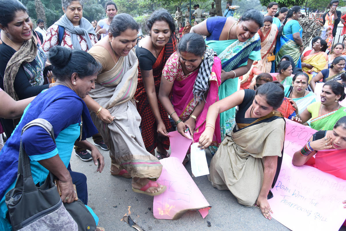 NEAR TOWN HALL Activists on Wednesday burnt a copy of the Transgender Persons (Protection of Rights) Bill