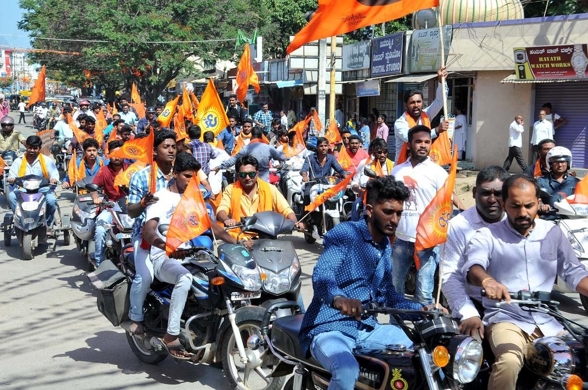 Vishwa Hindu Parishad and Bajrang Dal activists take out a bike rally in Chikkamagaluru on Wednesday.